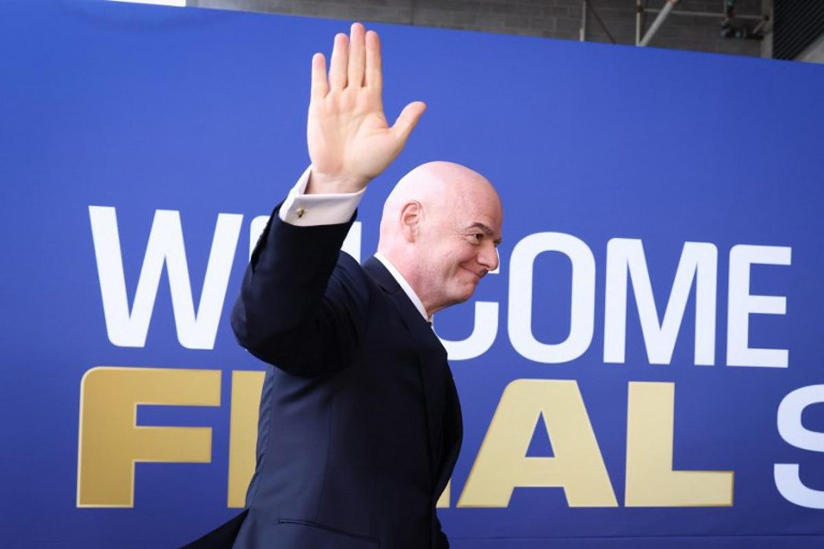 FIFA President Gianni Infantino waves as he arrives for the 2026 World Cup football tournament final match between Spain and Argentina at the New York/New Jersey Stadium in East Rutherford on July 19, 2026. CHARLY TRIBALLEAU / AFP