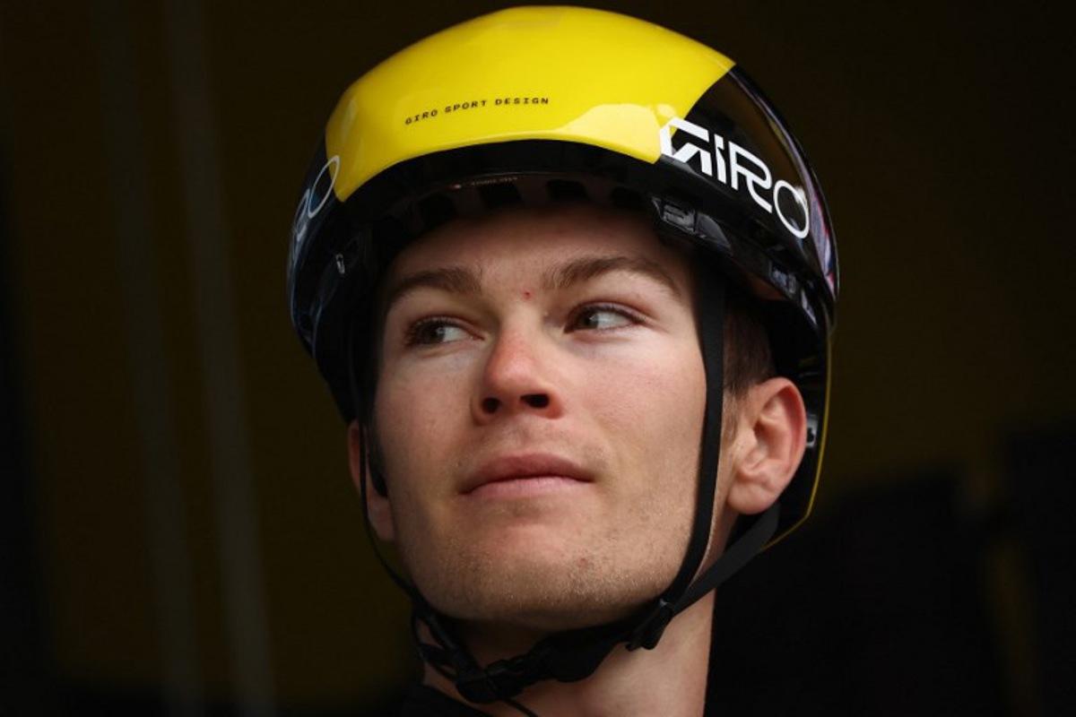 Team Visma-Lease a Bike's French rider Axel Zingle reacts prior to the start of the 5th stage of the Paris-Nice cycling race, 203,3 km between Saint-Just-en-Chevalet and La Côte-Saint-André, on March 13, 2025. Anne-Christine POUJOULAT / AFP