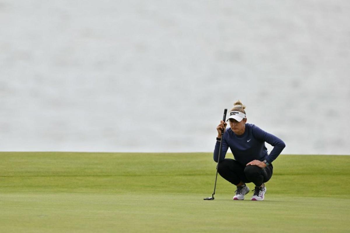 US player Nelly Korda lines up her put on the second green on day three of the Women's British Open Golf Championship, at Royal Porthcawl in south Wales on August 2, 2025. Glyn KIRK / AFP