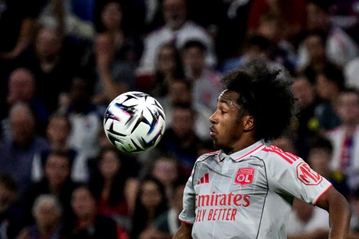 Lyon's Belgian forward #11 Malick Fofana controls the ball during the French L1 football match between Olympique Lyonnais (OL) and SCO Angers at the Groupama Stadium in Decines-Charpieu, near Lyon, central-eastern France on September 19, 2025. OLIVIER CHASSIGNOLE / AFP