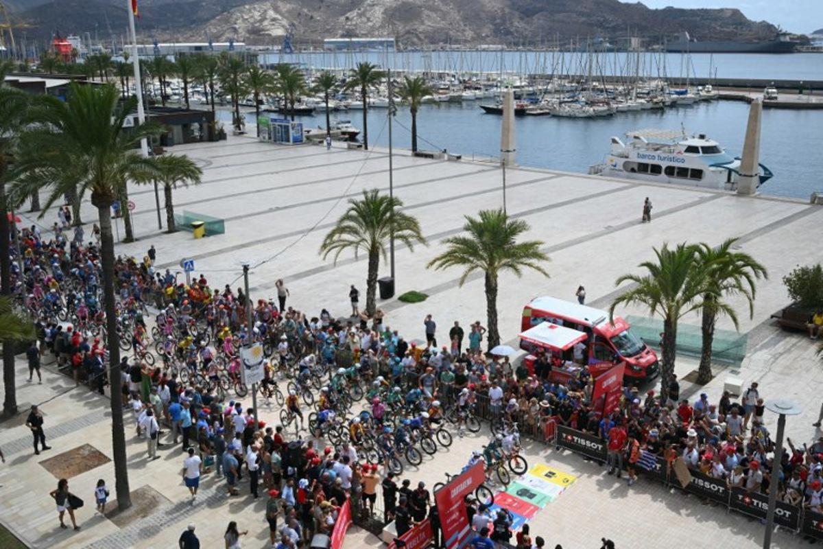 Cyclists ride at the start of the 11th stage of the Vuelta a Espana 2026 cycling tour, a 151,3 km race between Cartagena and Lorca, on September 2, 2026. JOSE JORDAN / AFP