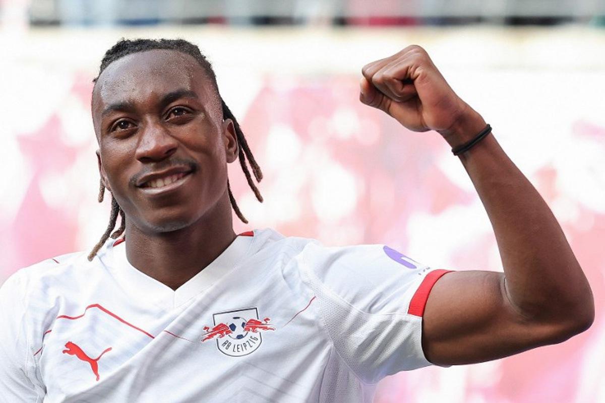 Leipzig's Ivorian forward #49 Yan Diomande celebrates scoring the opening goal during the German first division Bundesliga football match between RB Leipzig and Borussia Moenchengladbach in Leipzig, eastern Germany, on April 11, 2026. Ronny HARTMANN / AFP