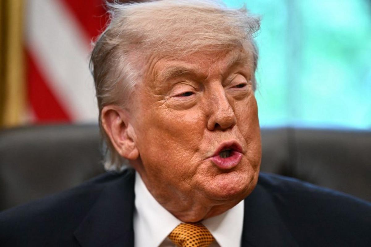 US President Donald Trump speaks about the upcoming "UFC Freedom 250" event, in the Oval Office of the White House on May 6, 2026, in Washington, DC. An Ultimate Fighting Championship event will be staged on the White House's South Lawn in June. The June 14 event has been dubbed "UFC Freedom 250," in reference to the United States' 250th anniversary celebrations this summer. Kent NISHIMURA / AFP