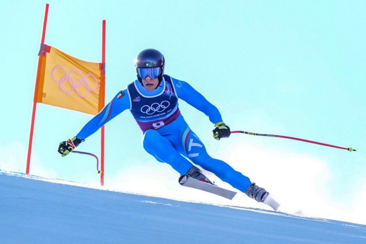 Italy's Giovanni Franzoni competes in the downhill run of the men's team combined alpine skiing event during the Milano Cortina 2026 Winter Olympic Games at the Stelvio Ski Centre in Bormio (Valtellina) on February 9, 2026. Dimitar DILKOFF / AFP