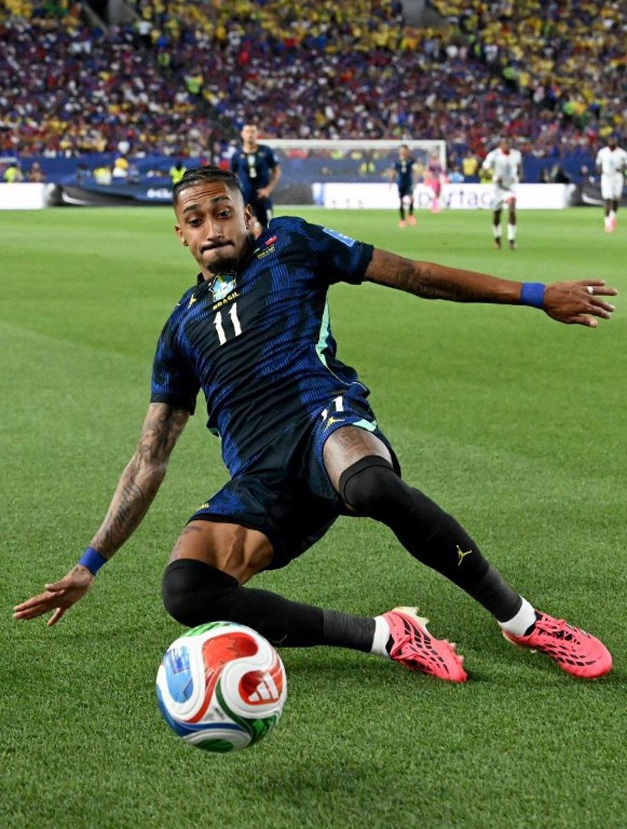 Brazil's forward #11 Raphinha slides for the ball during the 2026 World Cup Group C football match between Brazil and Haiti at the Philadelphia Stadium in Philadelphia on June 19, 2026. ROBERTO SCHMIDT / AFP