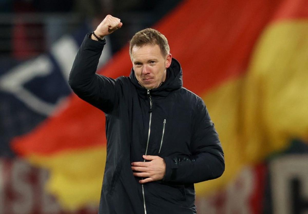 Germany's headcoach Julian Nagelsmann reacts after the FIFA World Cup 2026 European qualification Group A football match between Germany and Slovakia, at the Red Bull Arena in Leipzig, eastern Germany on November 17, 2025. Ronny HARTMANN / AFP