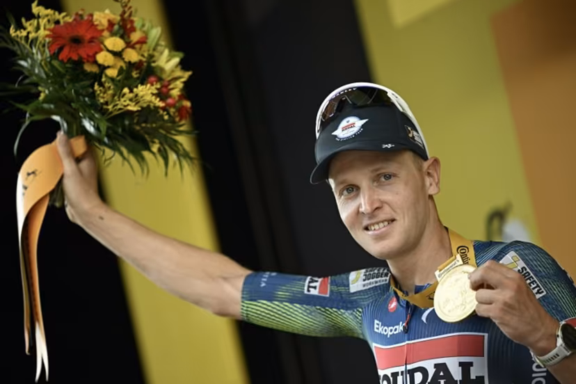 Soudal Quick-Step team's Belgian rider Tim Merlier celebrates on the podium after winning the 12th stage of the 113th edition of the Tour de France cycling race, 179,1 km between Circuit de Nevers Magny-Cours and Chalon-sur-Saône in central France, on July 16, 2026. Loic VENANCE / AFP