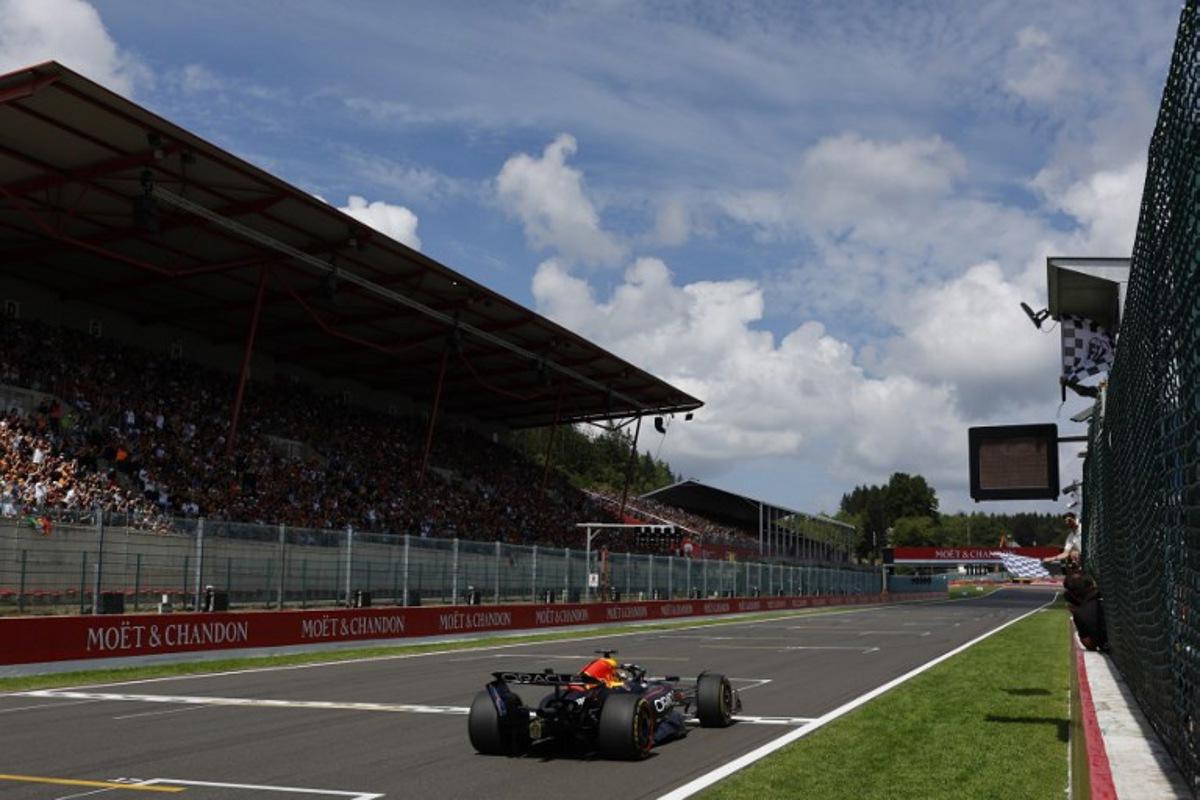 Red Bull Racing's Dutch driver Max Verstappen crosses the finish line in first position during the Sprint Race of the Formula One Belgian Grand Prix at the Spa-Francorchamps circuit in Spa, on July 26, 2025. STEPHANIE LECOCQ / POOL / AFP