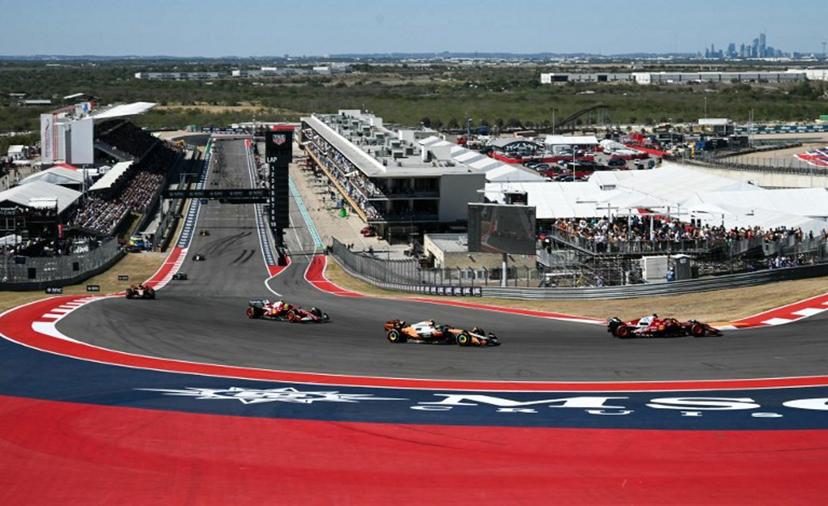 (From R/L) Ferrari's Monegasque driver Charles Leclerc races ahead of McLaren's British driver Lando Norris and Ferrari's British driver Lewis Hamilton during the United States Formula One Grand Prix at the Circuit of the Americas in Austin, Texas, on October 19, 2025. RONALDO SCHEMIDT / AFP
