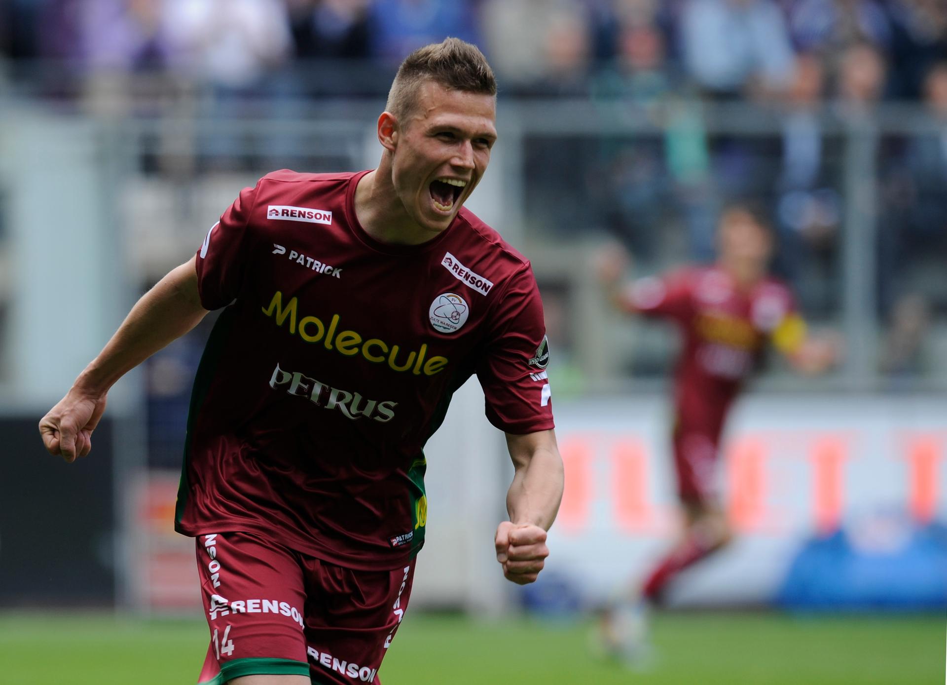 20130519 - BRUSSELS, BELGIUM: Essevee's Jens Naessens celebrates after scoring the 0-1 goal during the Jupiler Pro League match of Play-Off 1, between RSC Anderlecht and Zulte Waregem, in Brussels, Sunday 19 May 2013, on the last day of the Play-Off 1 of the Belgian soccer championship. BELGA PHOTO JOHN THYS