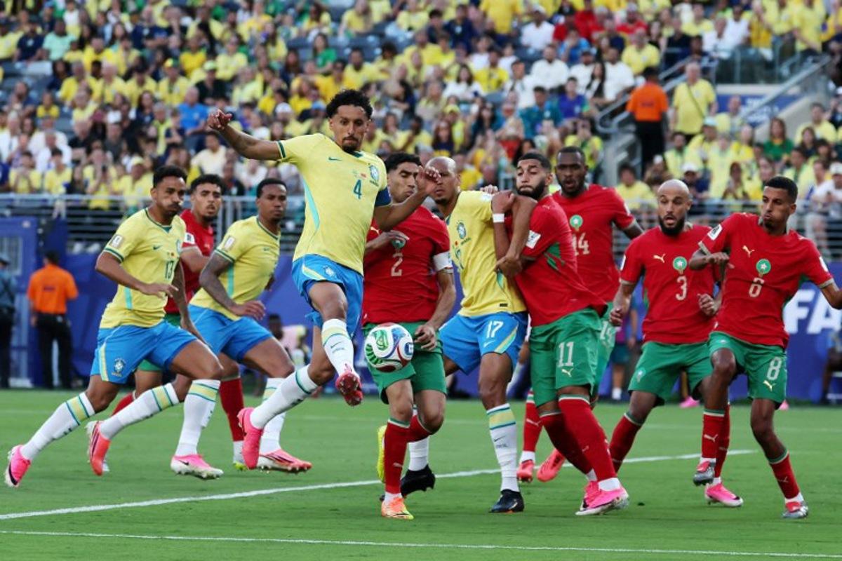 Brazil's defender #04 Marquinhos kicks the ball during the 2026 World Cup Group C football match between Brazil and Morocco at the New York/New Jersey Stadium in East Rutherford on June 13, 2026. TIMOTHY A. CLARY / AFP