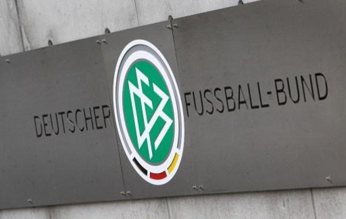 A logo is pictured at the headquarters of the German Football Federation (DFB) in Frankfurt am Main, western Germany, on November 3, 2015. Police raided offices of the German Football Federation (DFB) and homes of top officials over tax evasion allegations, as a scandal surrounding graft claims over the awarding of the 2006 World Cup widened. AFP PHOTO / DANIEL ROLAND