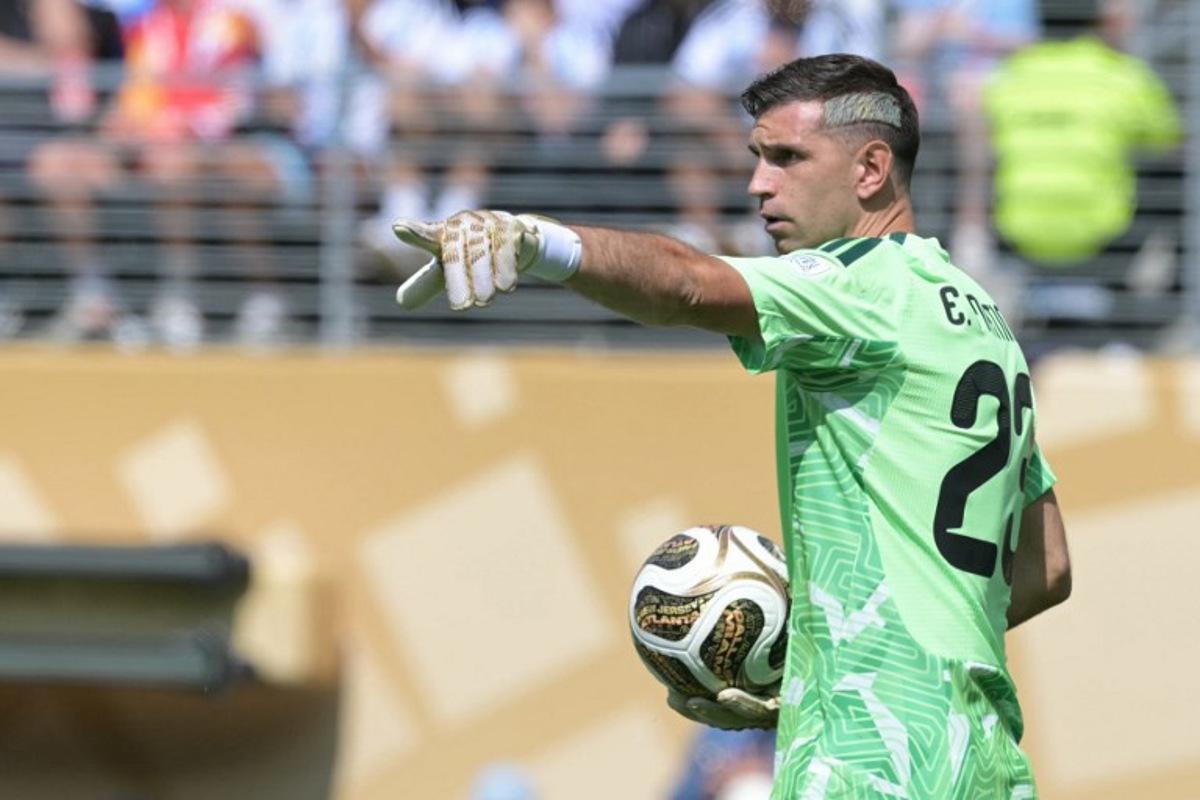 Argentina's goalkeeper #23 Emiliano Martinez gestures after making a save during the 2026 World Cup football tournament final match between Spain and Argentina at the New York/New Jersey Stadium in East Rutherford on July 19, 2026. JUAN MABROMATA / AFP