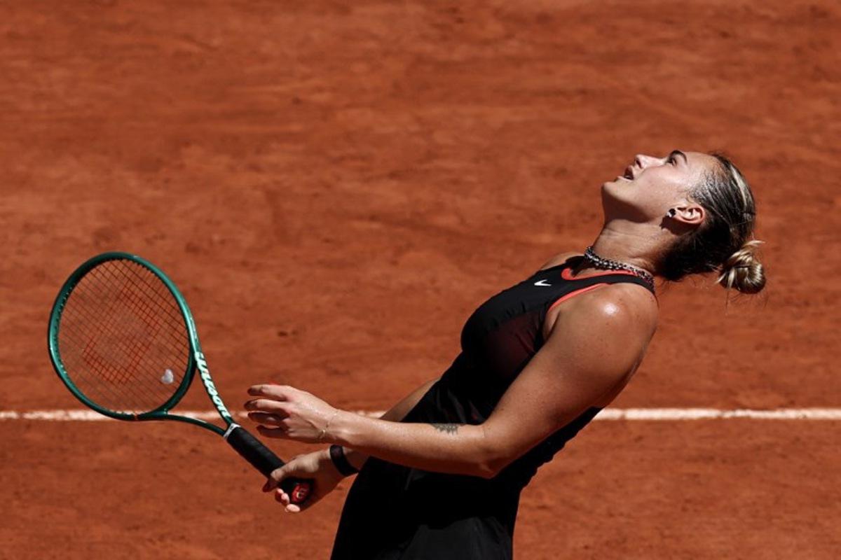 Belarus' Aryna Sabalenka reacts as she plays against Spain's Jessica Bouzas Maneiro during their women's singles match on day 3 of the French Open tennis tournament on Court Philippe-Chatrier at the Roland-Garros Complex in Paris on May 26, 2026. Anne-Christine POUJOULAT / AFP