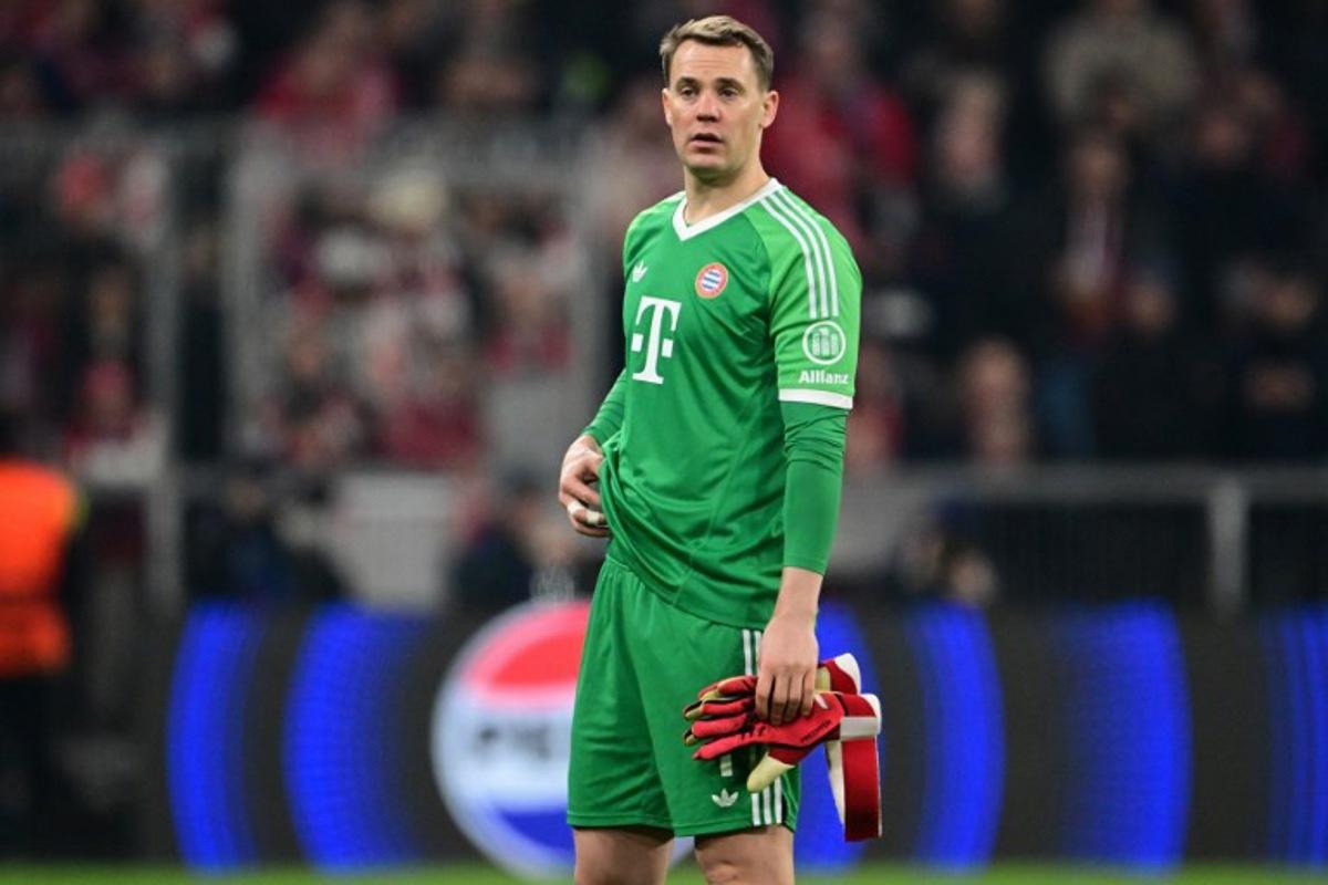 Bayern Munich's German goalkeeper #01 Manuel Neuer goes off after sustaining an injury during the UEFA Champions League last 16, first-leg, football match FC Bayern Munich v Bayer 04 Leverkusen on March 5, 2025 in Munich, southern Germany. Tobias SCHWARZ / AFP