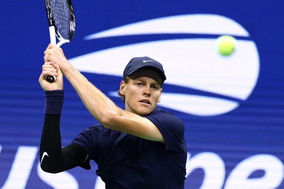 Italy's Jannik Sinner plays a forehand return to Kazakhstan's Alexander Bublik during their men's singles round of 16 tennis match on day nine of the US Open tennis tournament at the USTA Billie Jean King National Tennis Center in New York City, on September 1, 2025. CHARLY TRIBALLEAU / AFP