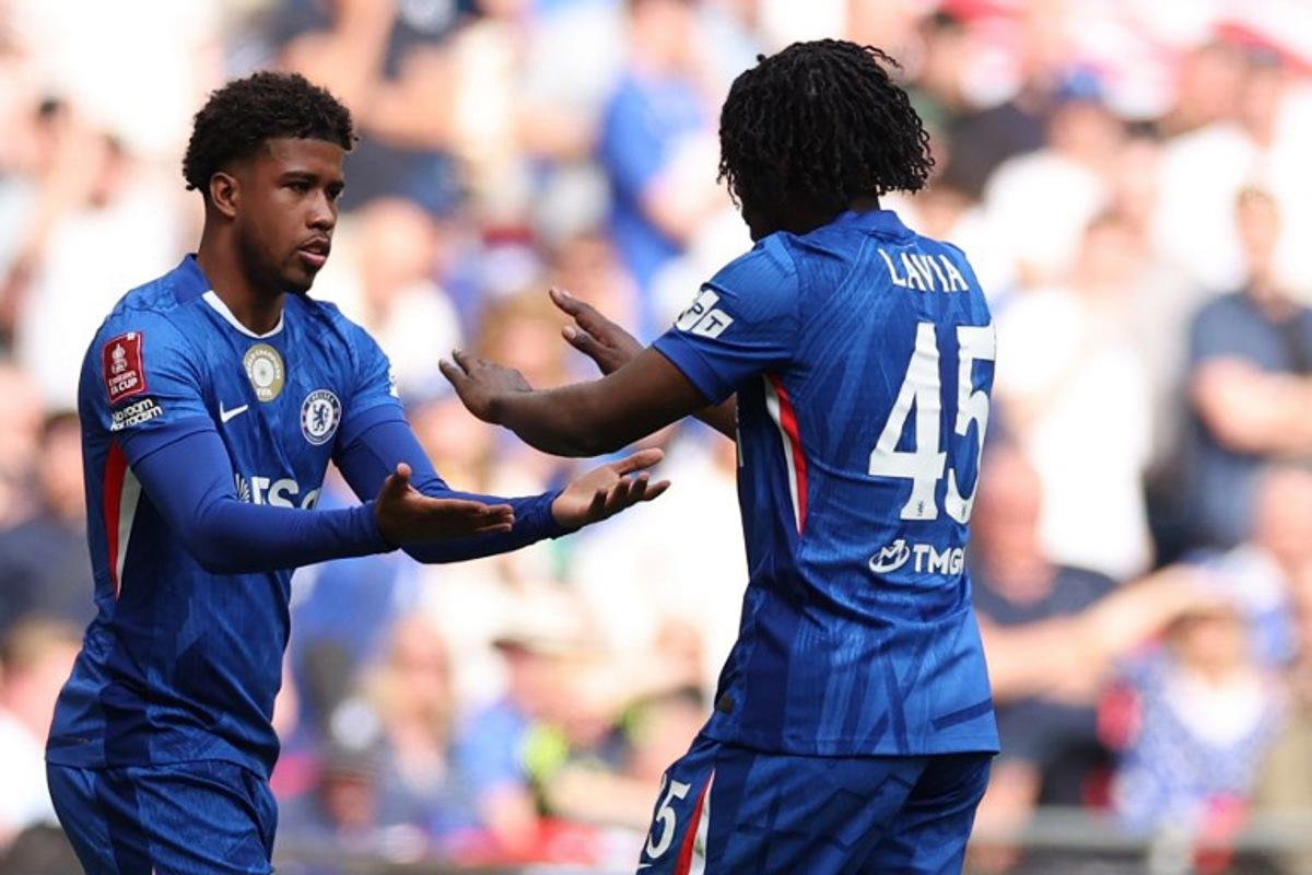 Chelsea's Brazilian midfielder #17 Andrey Santos (L) comes on for Chelsea's Belgian midfielder #45 Romeo Lavia (R) during the English FA Cup semi final football match between Chelsea and Leeds United at Wembley stadium in London, on April 26, 2026. Adrian Dennis / AFP