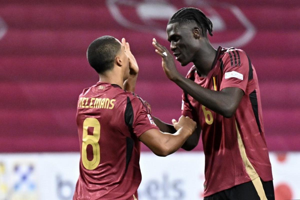 Belgium's midfielder #08 Youri Tielemans (L) celebrates with Belgium's midfielder #06 Amadou Onana after scoring the 2-1 goal during the UEFA Nations League football match League A, Group A2, Day 1, Belgium v Israel in Debrecen, Hungary, on September 6, 2024. Attila KISBENEDEK / AFP