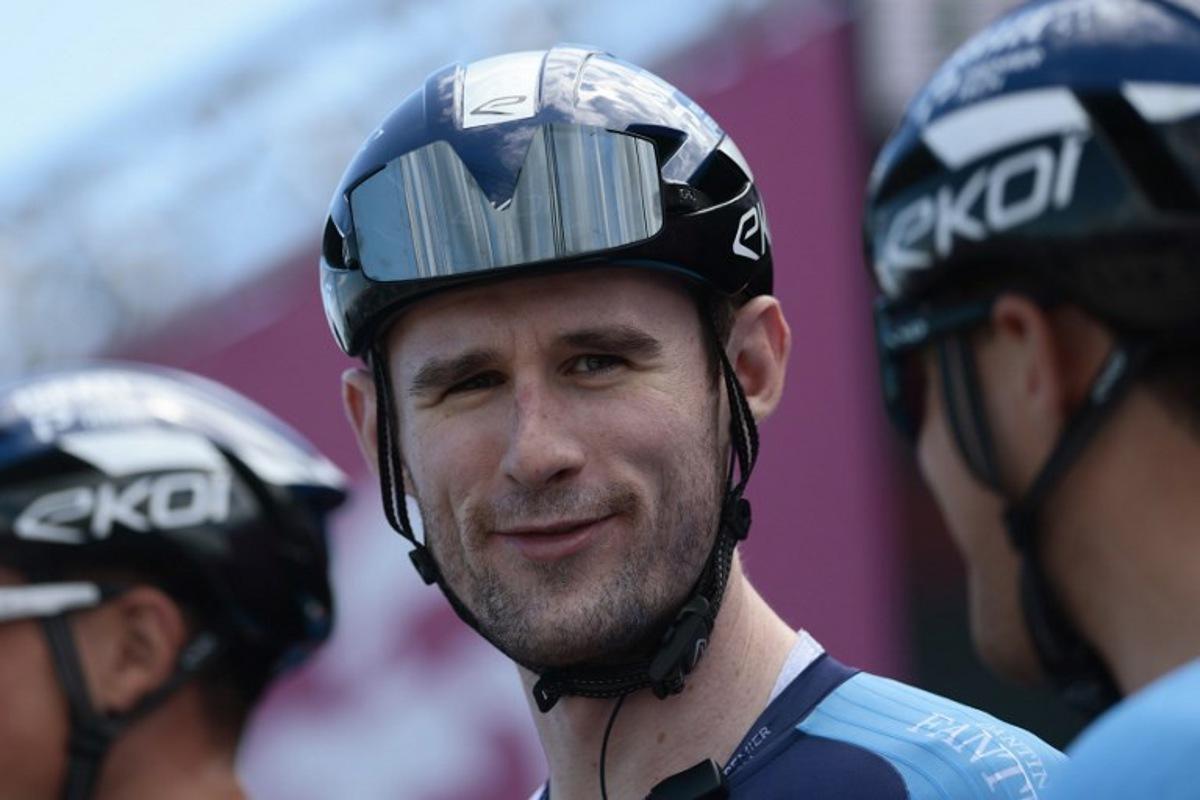 Israel-Premier Tech's Canadian rider Derek Gee is pictured on stage before the 8th stage of the 108th Giro d'Italia cycling race of 197kms from Giulianova to Castelraimondo on May 17, 2025. Luca Bettini / AFP