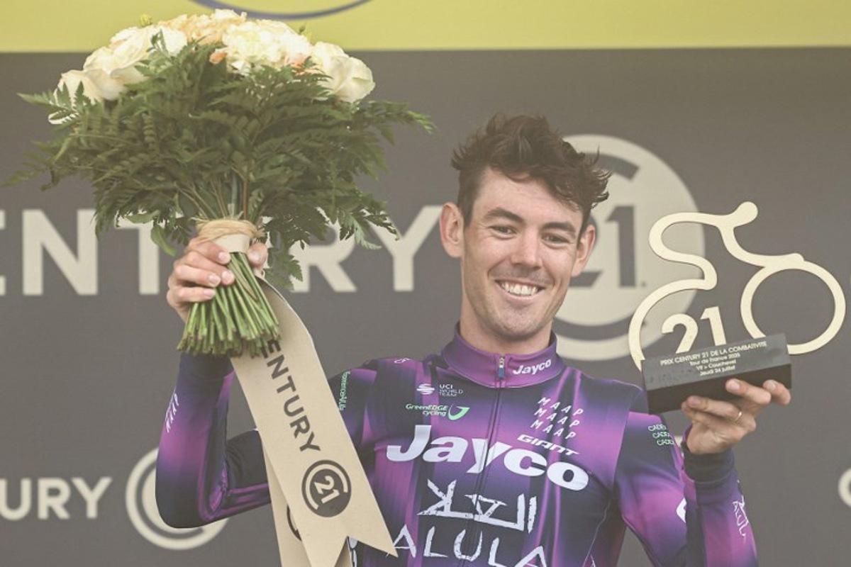 Team Jayco AlUla team's Australian rider Ben O'Connor celebrates on the podium with the combativity award after winning the 18th stage of the 112th edition of the Tour de France cycling race, 171.5 km between Vif and Courchevel Col de la Loze, in the Alps, southeastern France, on July 24, 2025. Anne-Christine POUJOULAT / AFP