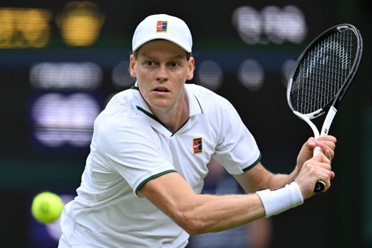 Italy's Jannik Sinner returns against Portugal's Nuno Borges during their men's singles second round tennis match on the third day of the 2026 Wimbledon Championships at The All England Lawn Tennis and Croquet Club in Wimbledon, southwest London, on July 1, 2026. Kirill KUDRYAVTSEV / AFP