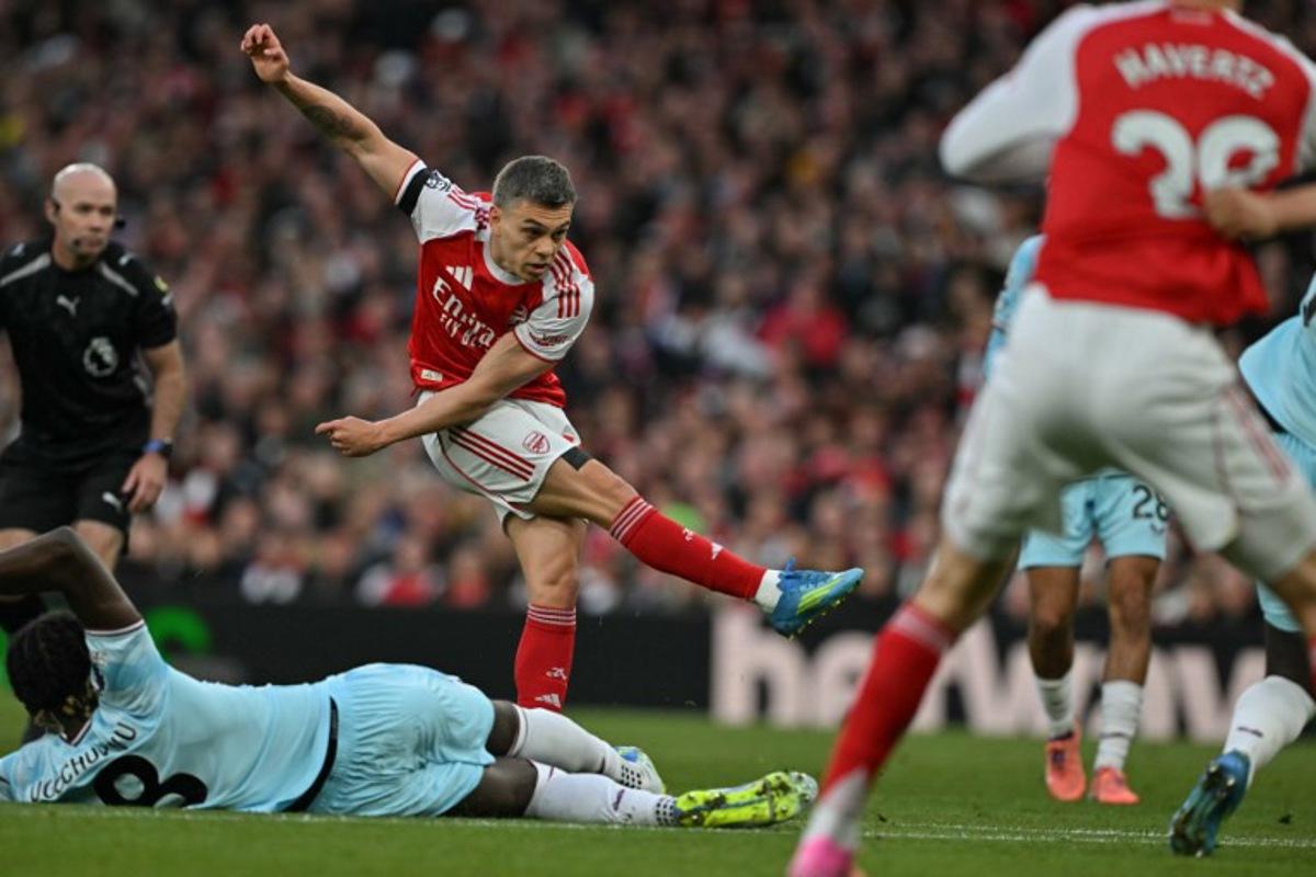Arsenal's Belgian midfielder #19 Leandro Trossard shoots but fails to score during the English Premier League football match between Arsenal and Burnley at the Emirates Stadium in London on May 18, 2026. Glyn KIRK / AFP