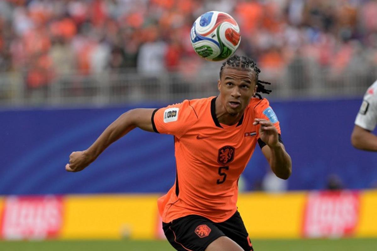 Netherlands' defender #05 Nathan Ake eyes on the ball during the 2026 World Cup Group F football match between Tunisia and the Netherlands at the Kansas City Stadium in Kansas City on June 25, 2026. Juan MABROMATA / AFP