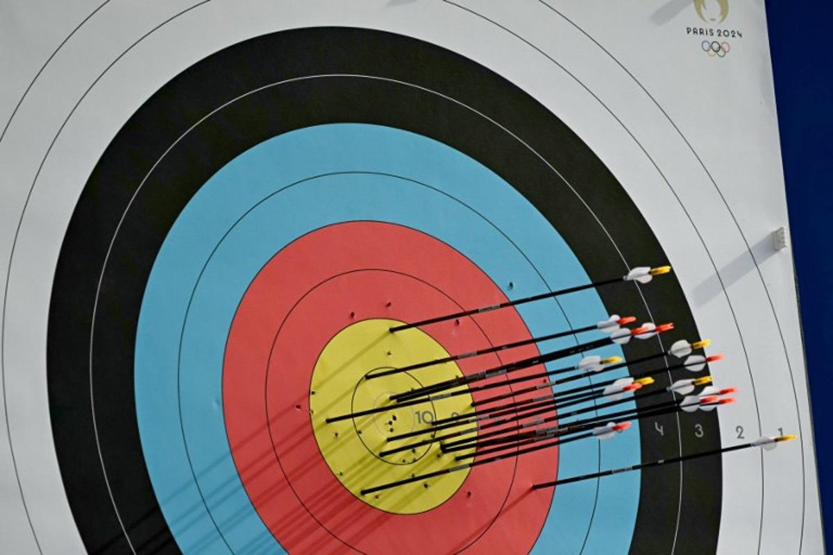 A detailed view of the target and arrows is seen during the archery women's individual preliminary round during the Paris 2024 Olympic Games at the Esplanade des Invalides in Paris on July 25, 2024. Punit PARANJPE / AFP