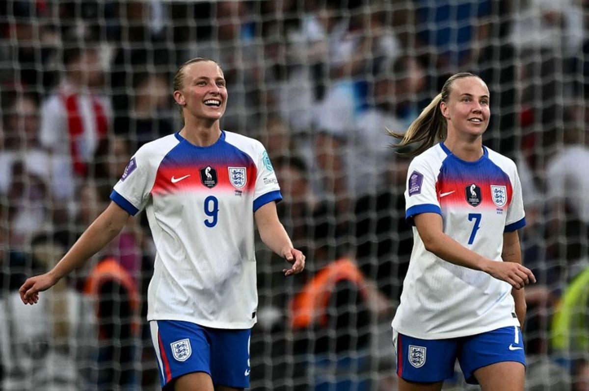 England's striker#07 Beth Mead (R) celebrates scoring the team's fourth goal with England's striker #09 Aggie Beever-Jones during the UEFA Women's Nations League Group A3 football match between England and Portugal at Wembley Stadium in London on May 30, 2025. Ben STANSALL / AFP