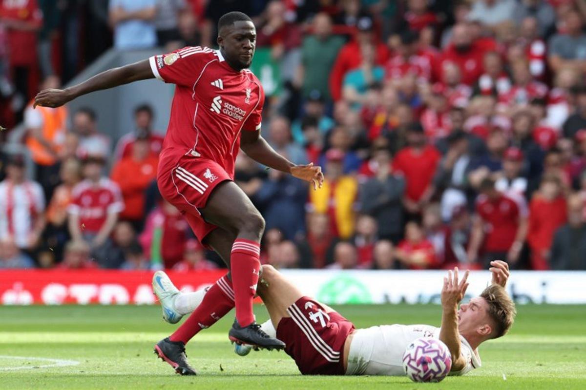 Liverpool's French defender #05 Ibrahima Konate (L) fouls Arsenal's Swedish striker #14 Viktor Gyokeres (R) during the English Premier League football match between Liverpool and Arsenal at Anfield in Liverpool, north west England on August 31, 2025. Darren Staples / AFP