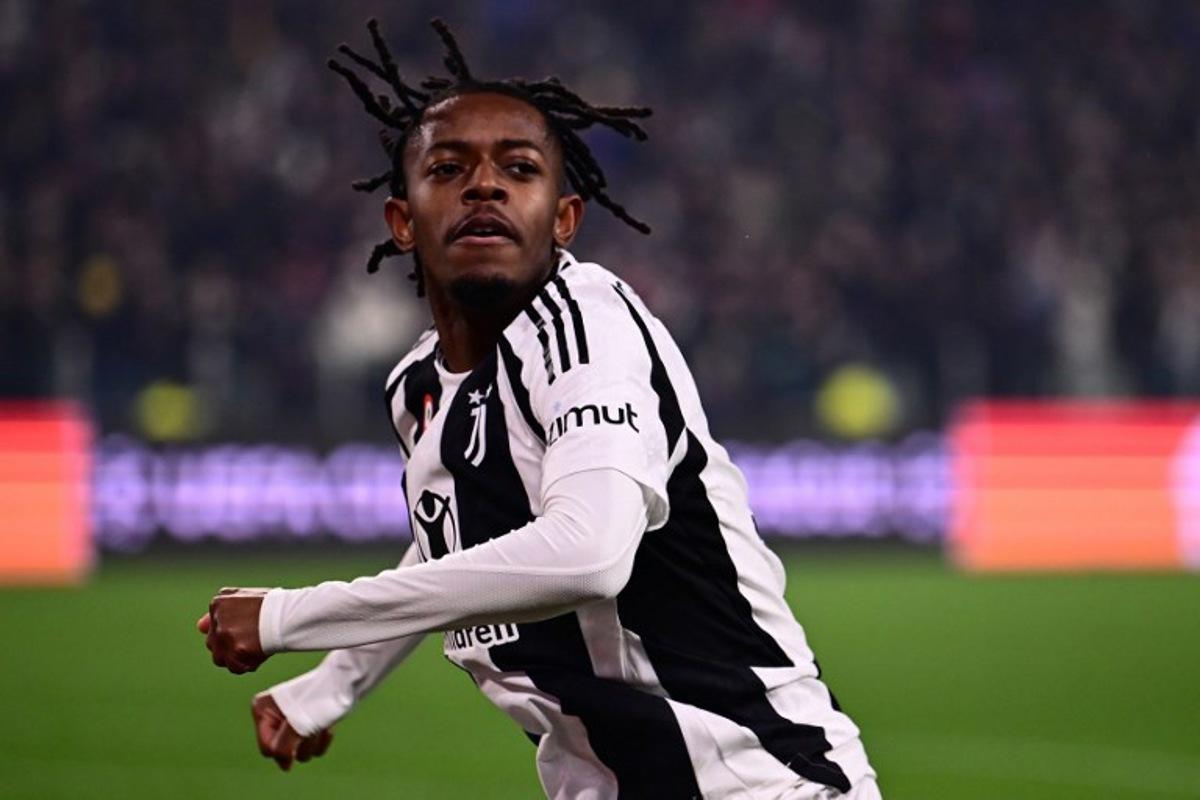 Juventus' Belgian forward #51 Samuel Mbangula celebrates scoring his team's second goal during the UEFA Champions League knockout phase play-off 1st leg football match between Juventus and PSV Eindhoven at the Allianz stadium in Turin, on February 11, 2025. Marco BERTORELLO / AFP