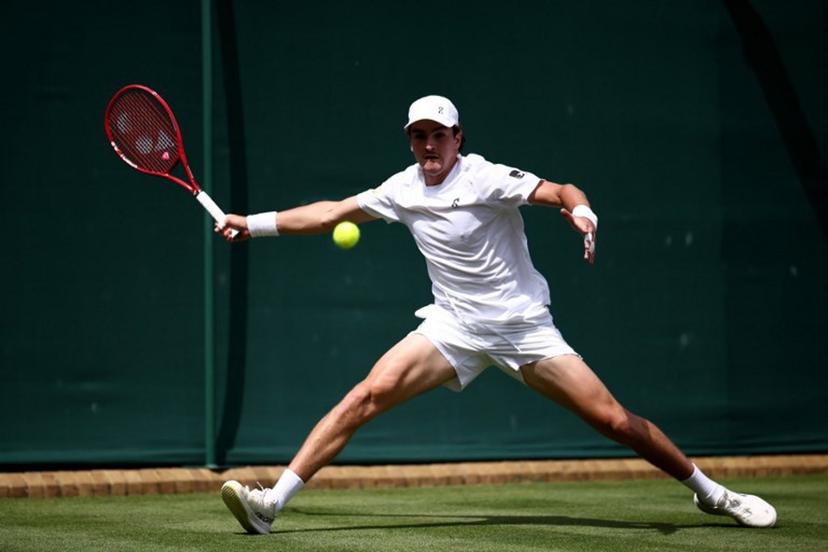 Brazil's Joao Fonseca returns to Spain's Roberto Bautista Agut during their men's singles first round tennis match on the first day of the 2026 Wimbledon Championships at The All England Lawn Tennis and Croquet Club in Wimbledon, southwest London, on June 29, 2026. Henry NICHOLLS / AFP