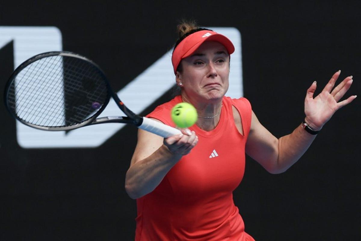 Ukraine's Elina Svitolina hits a return to USA's Madison Keys during their women's singles quarter-final match on day eleven of the Australian Open tennis tournament in Melbourne on January 22, 2025. Adrian DENNIS / AFP