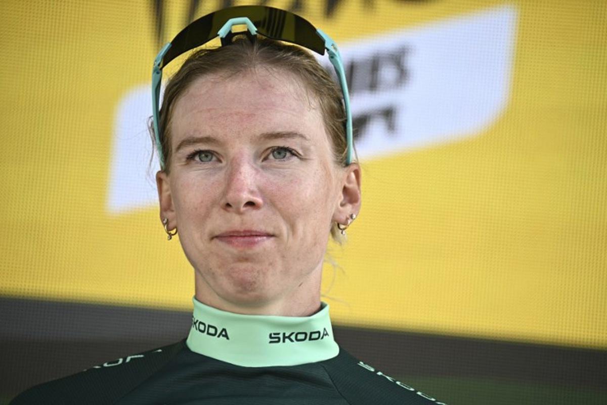 Team SD Worx - Protime's Dutch rider Lorena Wiebes celebrates on the podium with the best sprinter's green jersey after the 6th stage (out of 9) of the fourth edition of the Women's Tour de France cycling race, 123.7 km from Clermont-Ferrand to Ambert, in Ambert, central France on July 31, 2025. JULIEN DE ROSA / AFP