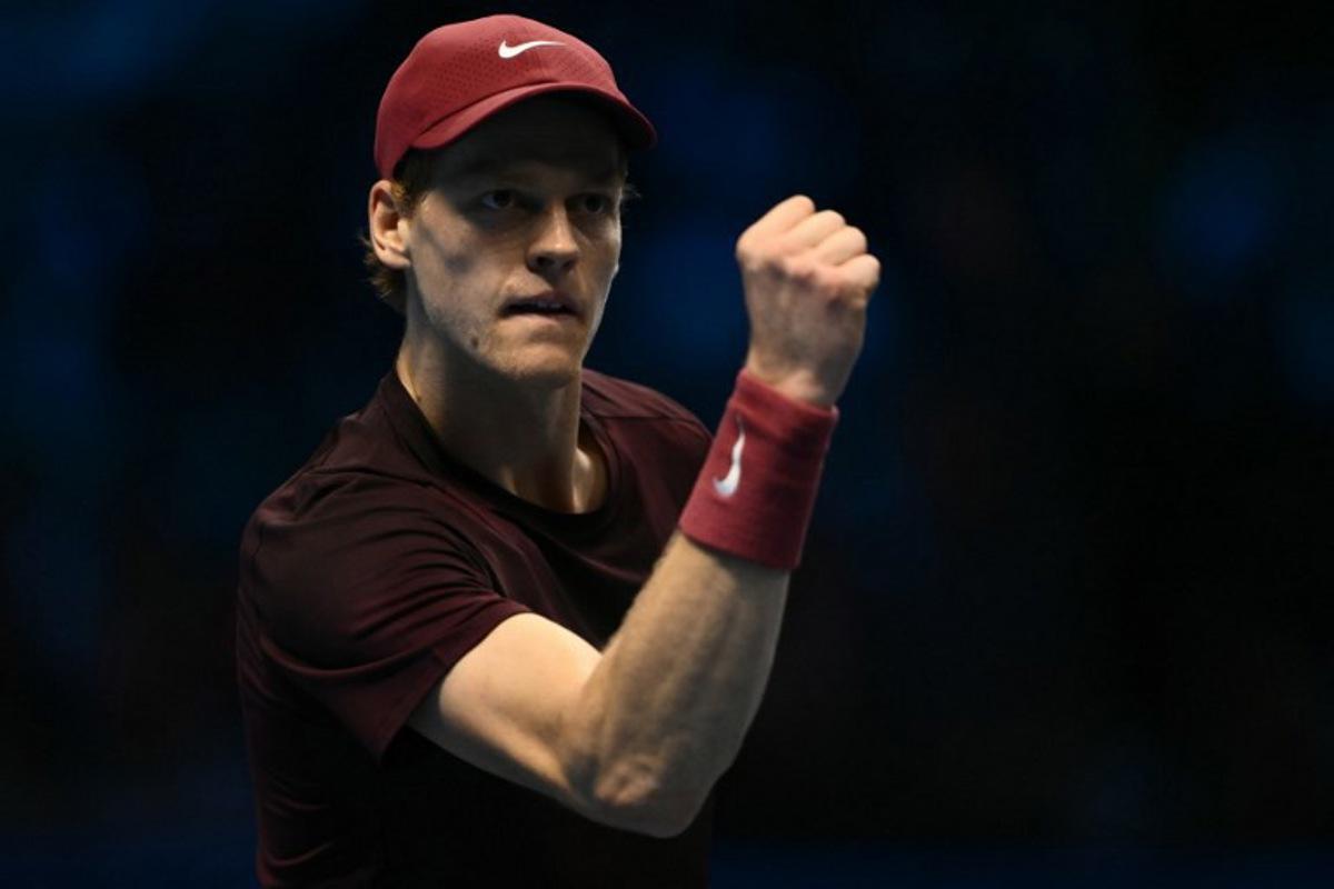 Italy's Jannik Sinner reacts during his match against Germany's Alexander Zverev at the ATP Finals tennis tournament in Turin on November 12, 2025. Marco BERTORELLO / AFP
