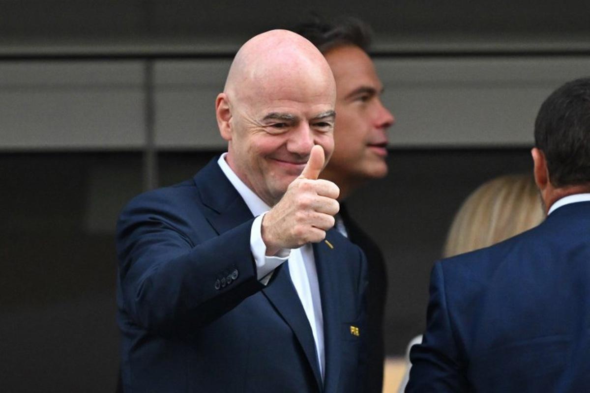 FIFA president Gianni Infantino gives a thumbs up ahead of the 2026 World Cup Group D football match between USA and Paraguay at the Los Angeles Stadium in Inglewood on June 12, 2026. Patrick T. Fallon / AFP