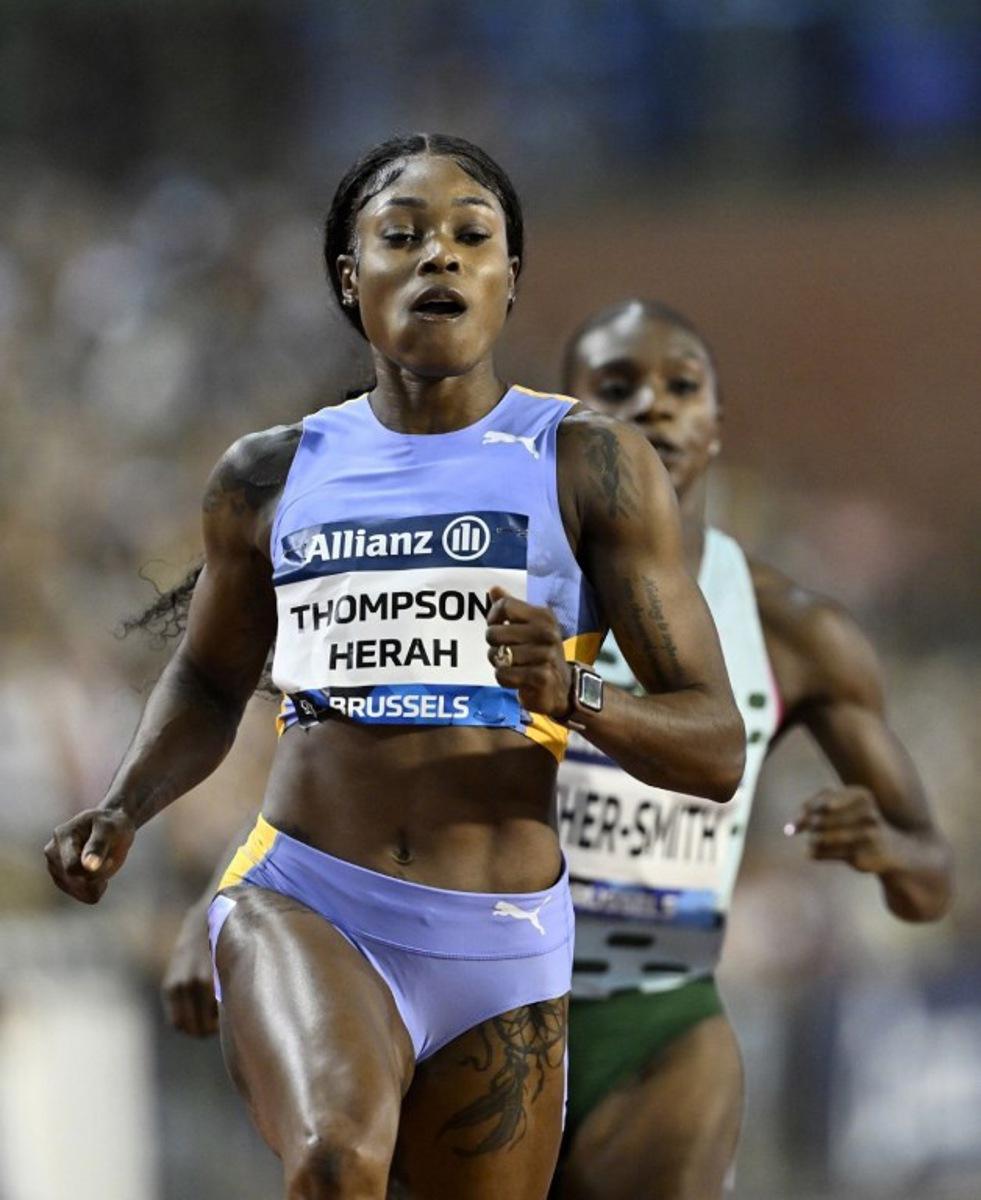 Jamaica's Elaine Thompson-Herah reacts as she wins the Women 100m event of the Brussels IAAF Diamond League athletics meeting on September 8, 2023 at the King Baudouin stadium. JOHN THYS / AFP