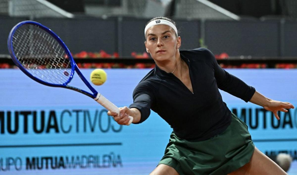 Ukraine's Marta Kostyuk returns the ball to Austria's Anastasia Potapova during their 2026 WTA Tour Madrid Open tennis tournament women's semi-final singles match at the Caja Magica in Madrid, on April 30, 2026. Javier SORIANO / AFP