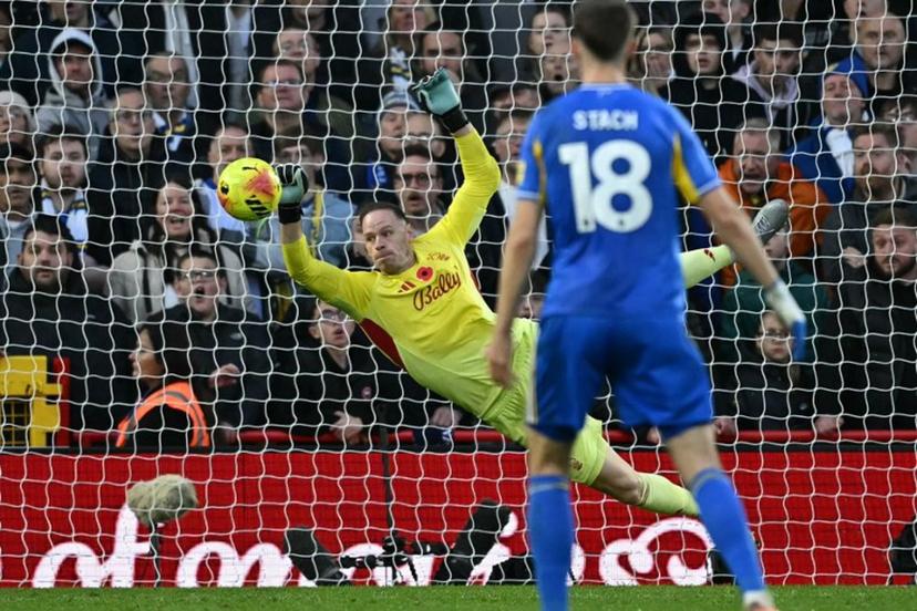 Nottingham Forest's Belgian goalkeeper #26 Matz Sels makes a save during the English Premier League football match between Nottingham Forest and Leeds United at The City Ground in Nottingham, central England, on November 9, 2025. JUSTIN TALLIS / AFP