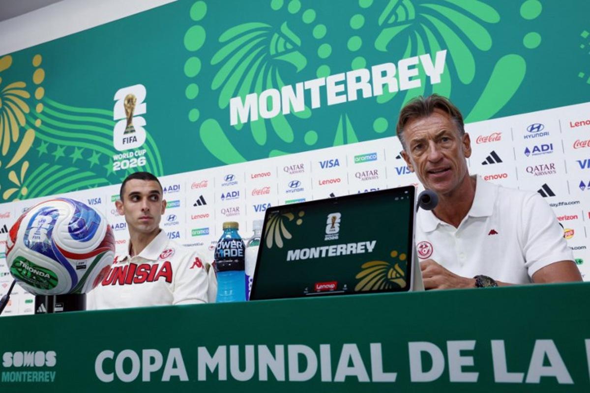 Tunisia's French head coach Herve Renard (R) and midfielder #17 Ellyes Skhiri give an MD-1 press conference at the Monterrey Stadium in Guadalupe, Mexico on June 19, 2026, on the eve of the 2026 World Cup Group F football match between Tunisia and Japan. Julio Cesar AGUILAR / AFP