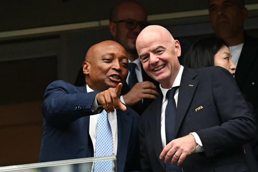 Confederation of African Football (CAF) President Patrice Motsepe (L) points out as he talks with FIFA President Gianni Infantino (R) ahead of the 2026 World Cup round of 16 football match between Canada and Morocco at the Houston Stadium in Houston on July 4, 2026. Paul ELLIS / AFP