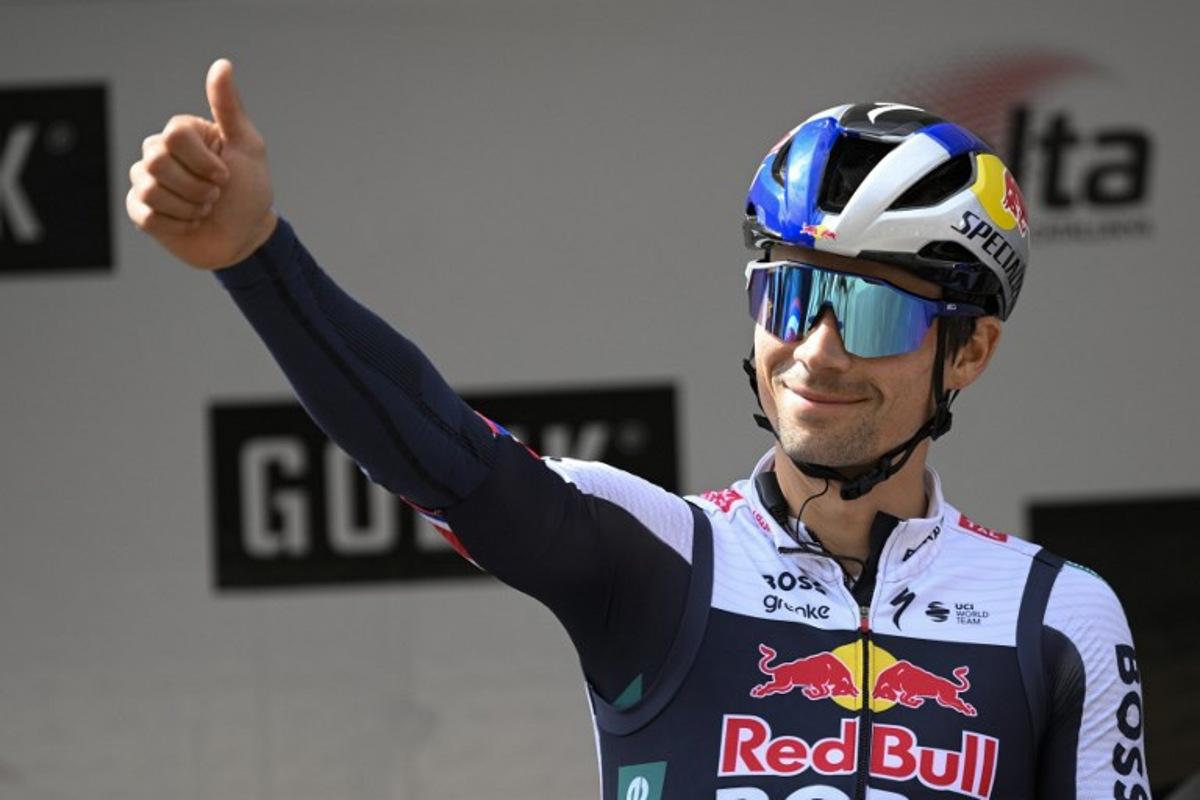 Team Bora's Slovenian Primoz Roglic gives a thumb up on the podium prior the start of the first stage of the 2025 Volta a Catalonya cycling tour of Catalonya, a 178,3 km loop starting and finishing in Sant Feliu de Guixols, on March 24, 2025. Josep LAGO / AFP