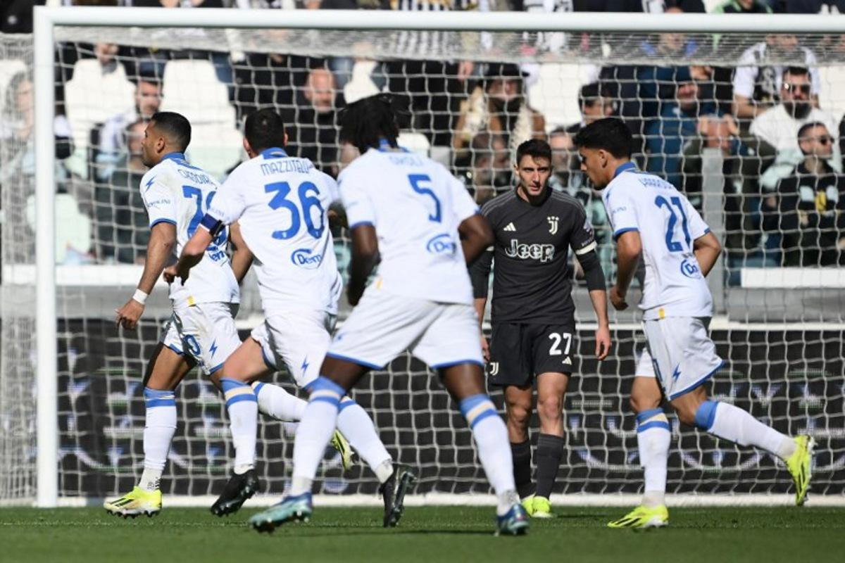 Frosinone's Moroccan forward Walid Cheddira (L) celebrates after scoring a goal during the Italian Serie A football match Juventus vs Frosinone on February 25, 2024 at the "Allianz Stadium" in Turin. MARCO BERTORELLO / AFP