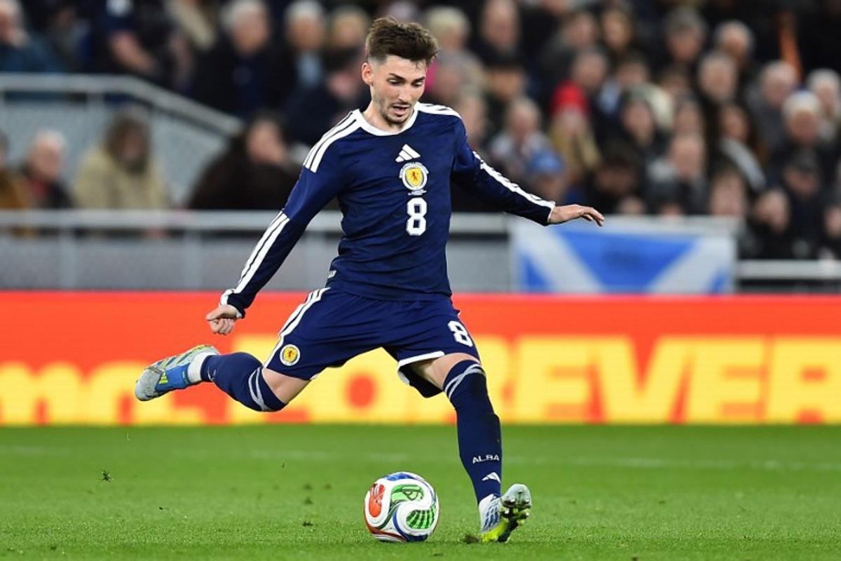 Scotland's midfielder #08 Billy Gilmour passes the ball during the friendly international football match between Scotland and Ivory Coast at the Hill Dickinson Stadium in Liverpool, north west England on March 31, 2026. PETER POWELL / AFP