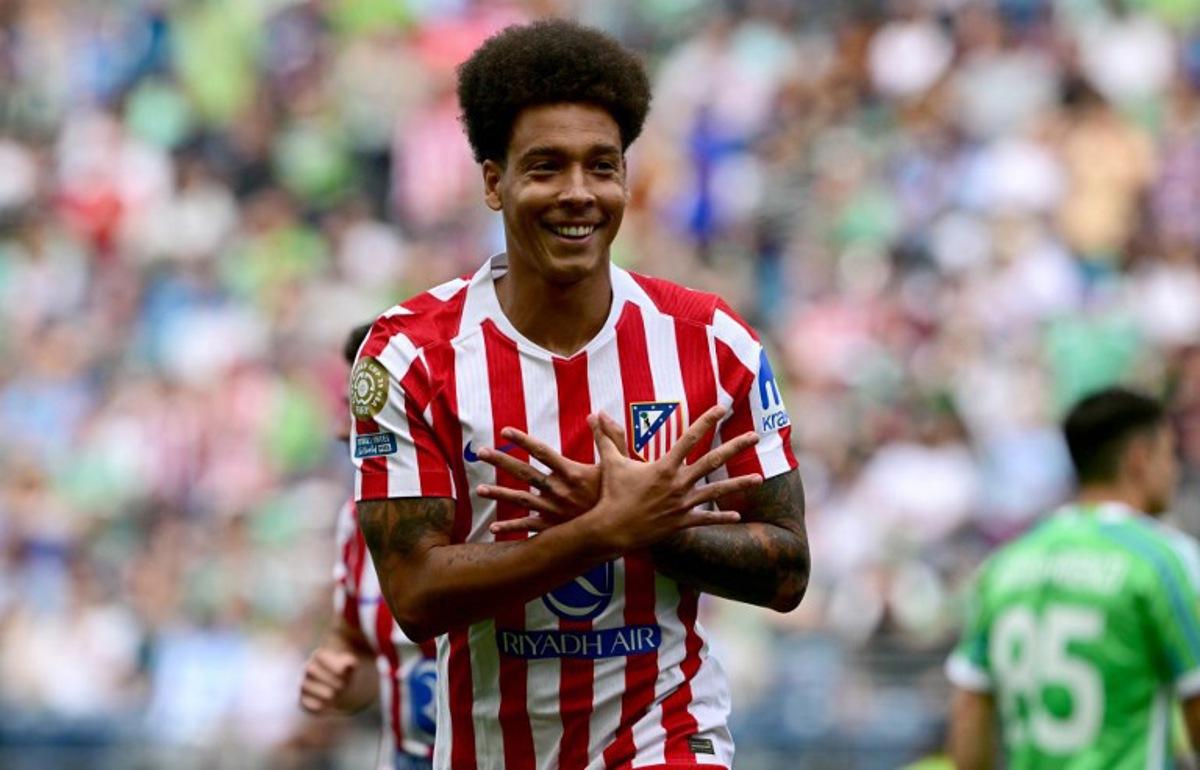 Atletico Madrid's Belgian midfielder #20 Axel Witsel celebrates scoring his team's second goal during the FIFA Club World Cup 2025 Group B football match between US Seattle Sounders and Spain's Atletico de Madrid at the Lumen Field stadium in Seattle on June 19, 2025. Pablo PORCIUNCULA / AFP
