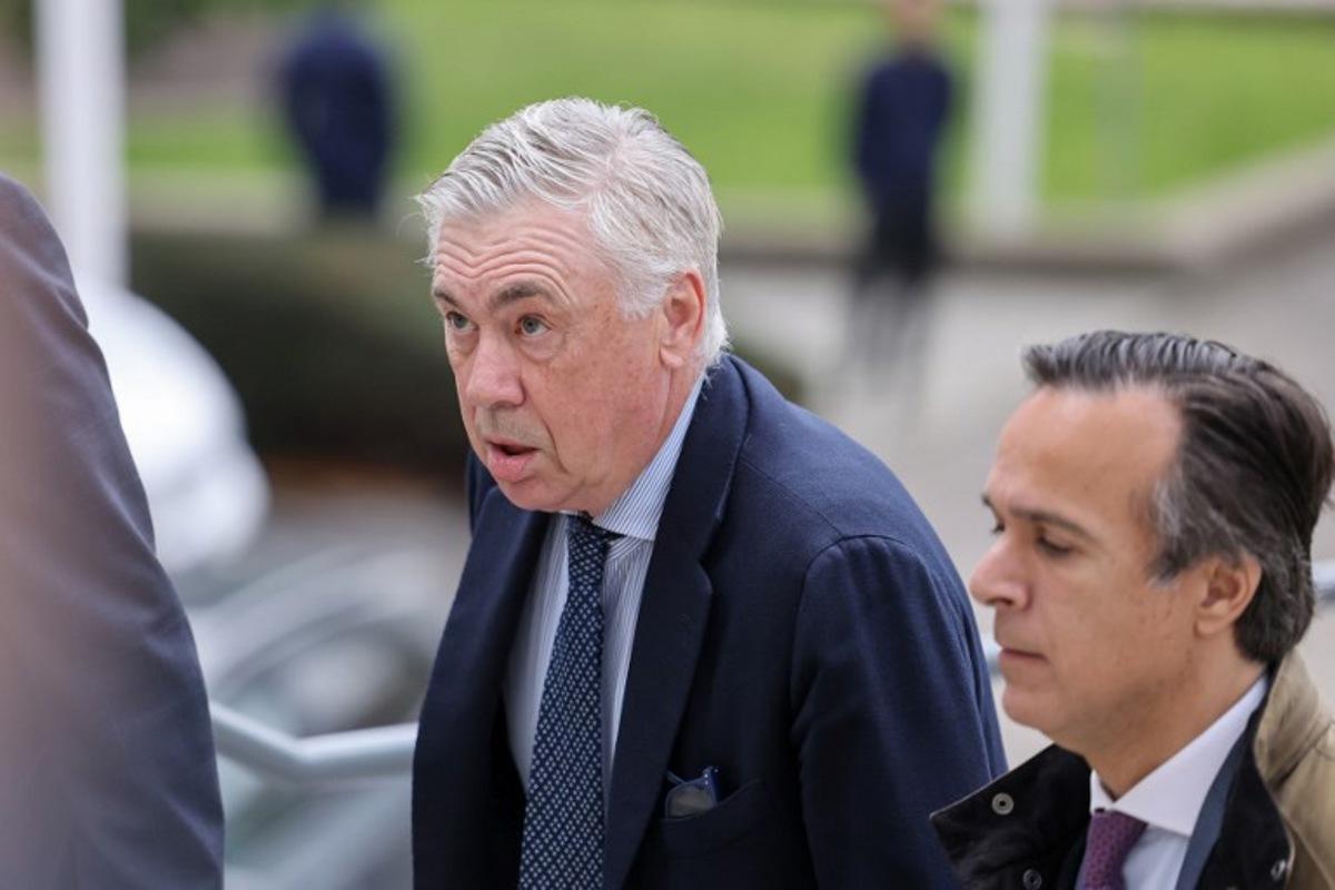 Real Madrid's Italian coach Carlo Ancelotti arrives to the High Court of Justice of Madrid to go on trial accused of tax evasion of 1 million euros, the latest in a string of such cases targeting sports figures in the country, in Madrid, on April 2, 2025. Prosecutors are seeking a jail term of four years and nine months for the 65-year-old Italian, accusing him of costing Spain's treasury more than one million euros ($1.1 million) in undeclared earnings from image rights in 2014 and 2015. Ancelotti is accused of only declaring in his tax returns the personal remuneration received from Real Madrid during those two years even though he declared himself a tax resident in Spain and indicated his home was in Madrid. Thomas COEX / AFP