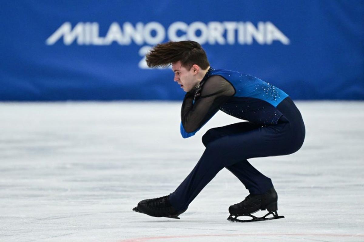Kazakhstan's Mikhail Shaidorov competes in the figure skating men's singles free skating final during the Milano Cortina 2026 Winter Olympic Games at Milano Ice Skating Arena in Milan on February 13, 2026. Piero CRUCIATTI / AFP