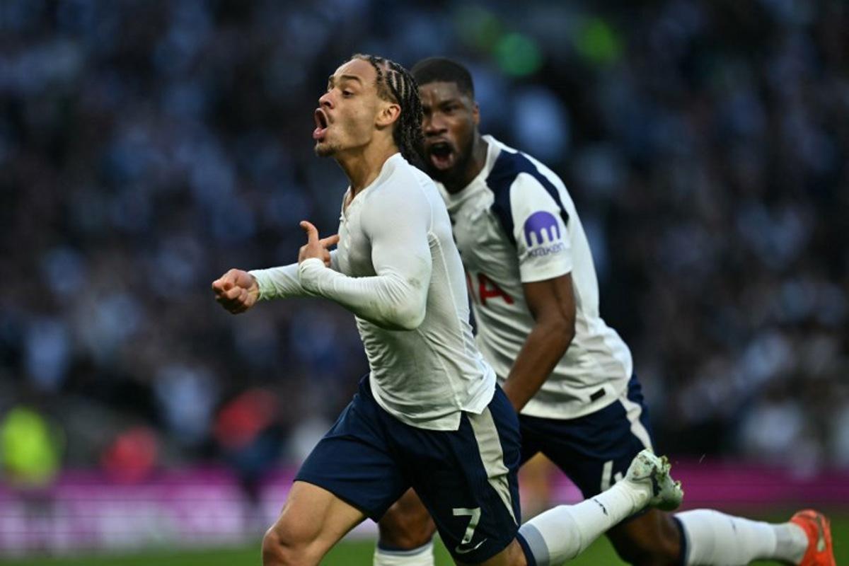 Tottenham Hotspur's Dutch midfielder #07 Xavi Simons (L) celebrates after scoring their second goal during the English Premier League football match between Tottenham Hotspur and Brighton and Hove Albion at the Tottenham Hotspur Stadium in London, on April 18, 2026. Ben STANSALL / AFP