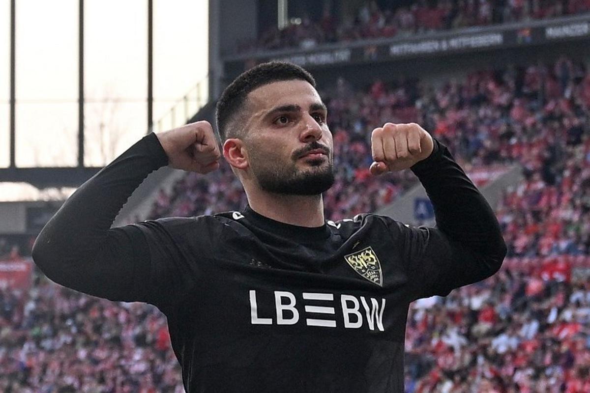Stuttgart's German forward #26 Deniz Undav celebrates scoring the 1-2 goal with his teammates during the German first division Bundesliga football match between 1 FSV Mainz 05 and VfB Stuttgart in Mainz, western Germany on March 7, 2026. Kirill KUDRYAVTSEV / AFP