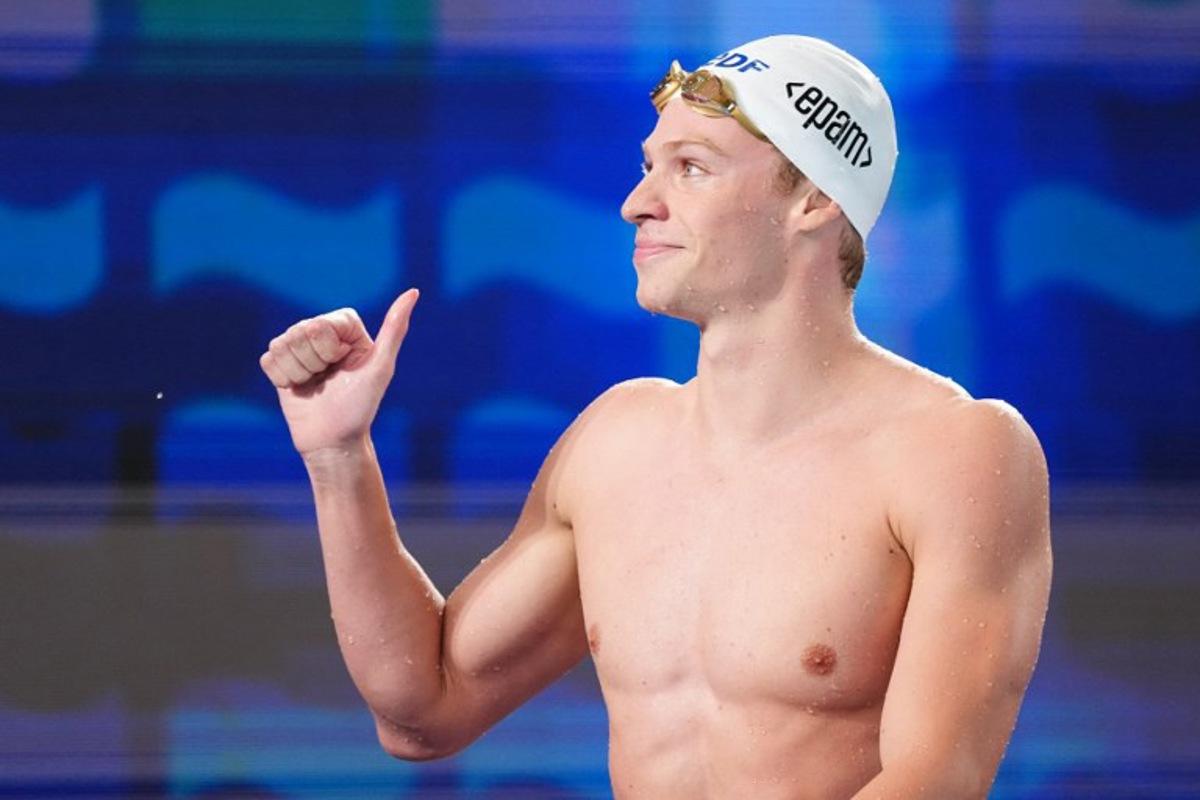 France's Leon Marchand reacts after winning the final of the men's 200m butterfly swimming event during the LEN European Aquatics Championships at the Olympic Aquatic Centre in Saint-Denis, northern suburbs of Paris, on August 15, 2026. SEBASTIEN BOZON / AFP